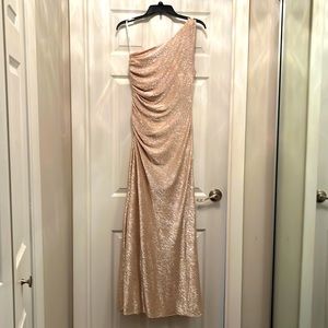 Gold shimmer one shoulder Calvin Klein gown.
